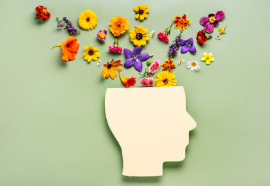 mental health graphic with flowers coming out of the top of a head