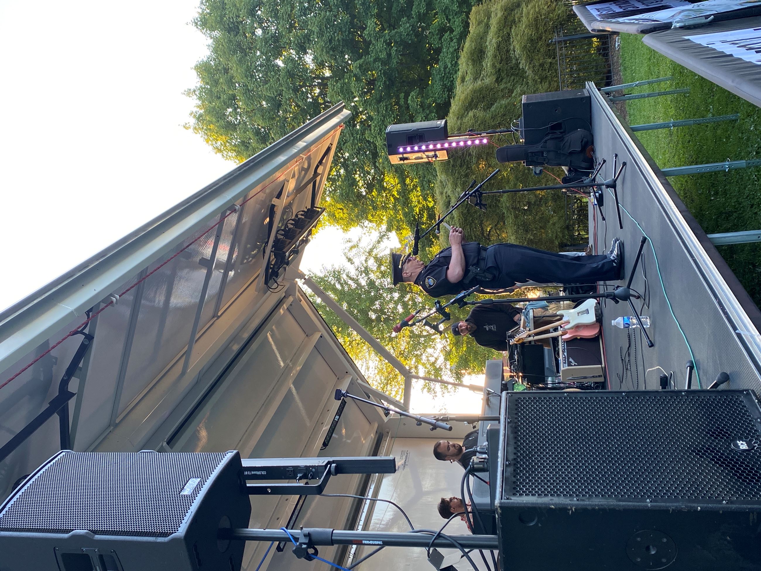 Police chief on stage addressing crowd