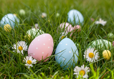 easter eggs in grass wtih flowers