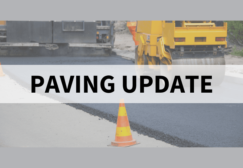 graphic with faded background image of road being paved and text in the front that reads paving upda